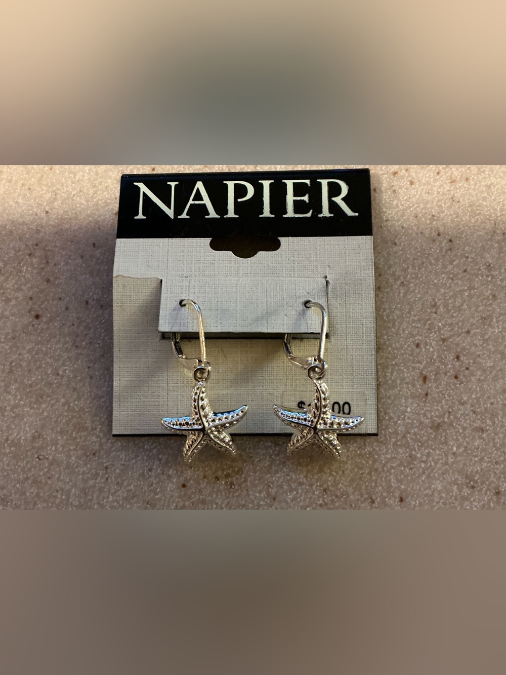 Silver Tone Starfish leaver back earrings